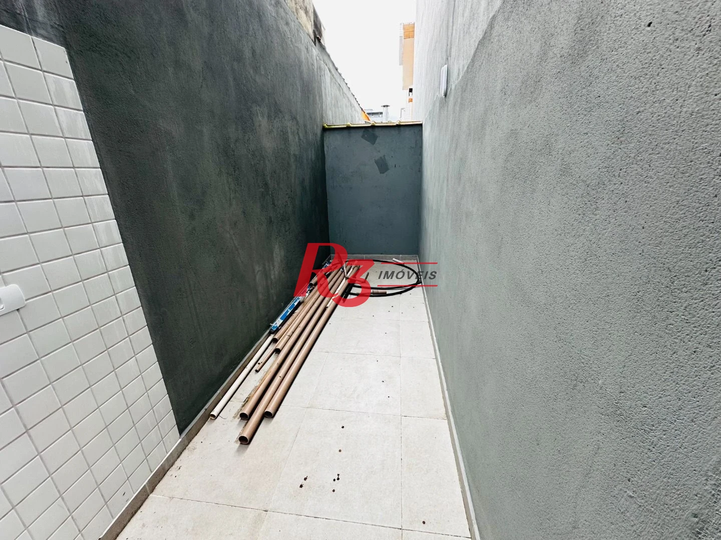 Sobrado com 3 dormitórios à venda, 160 m² por R$ 950.000,00 - Embaré - Santos/SP