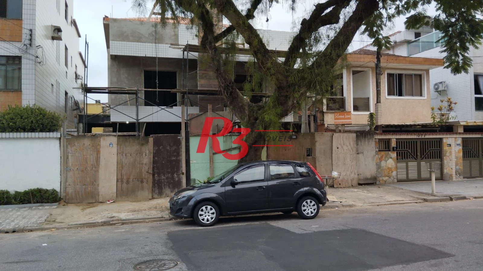 Sobrado Térreo com 3 dormitórios à venda, 160 m² por R$ 1.050.000 - Embaré - Santos/SP