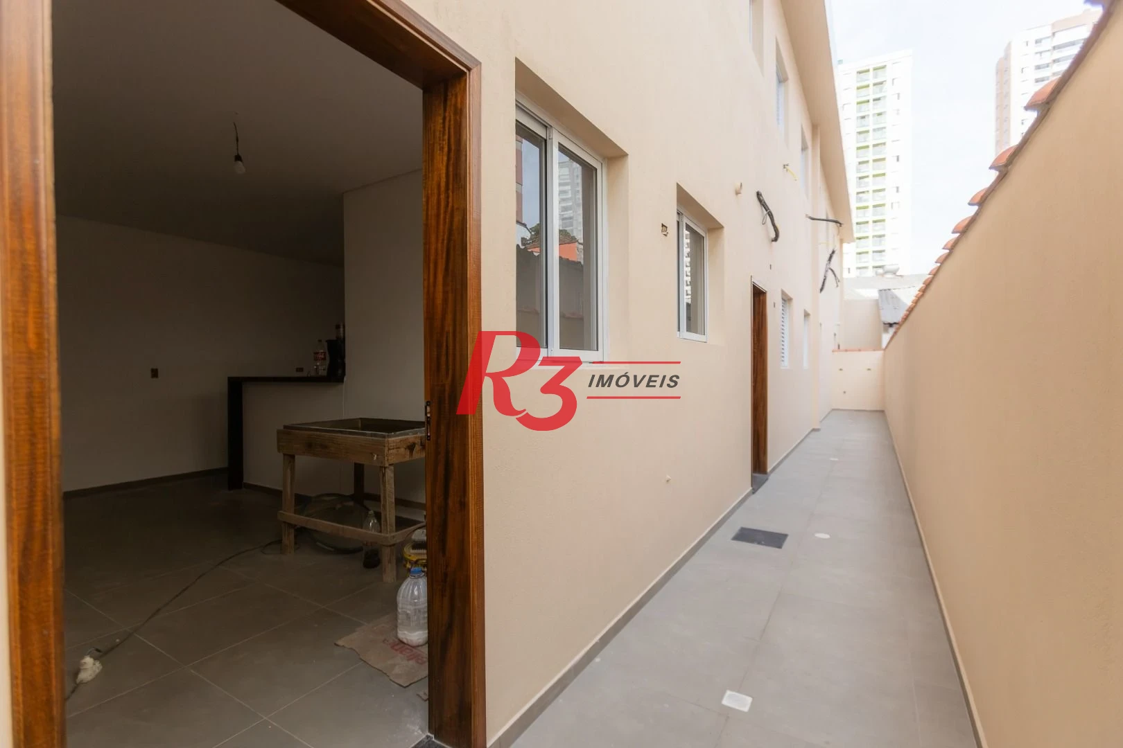 Casa com 3 dormitórios à venda, 104 m² por R$ 950.000,00 - Encruzilhada - Santos/SP