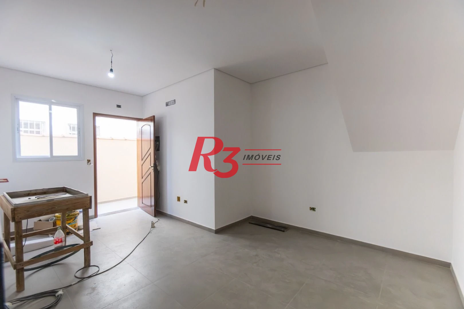 Casa com 3 dormitórios à venda, 104 m² por R$ 950.000,00 - Encruzilhada - Santos/SP