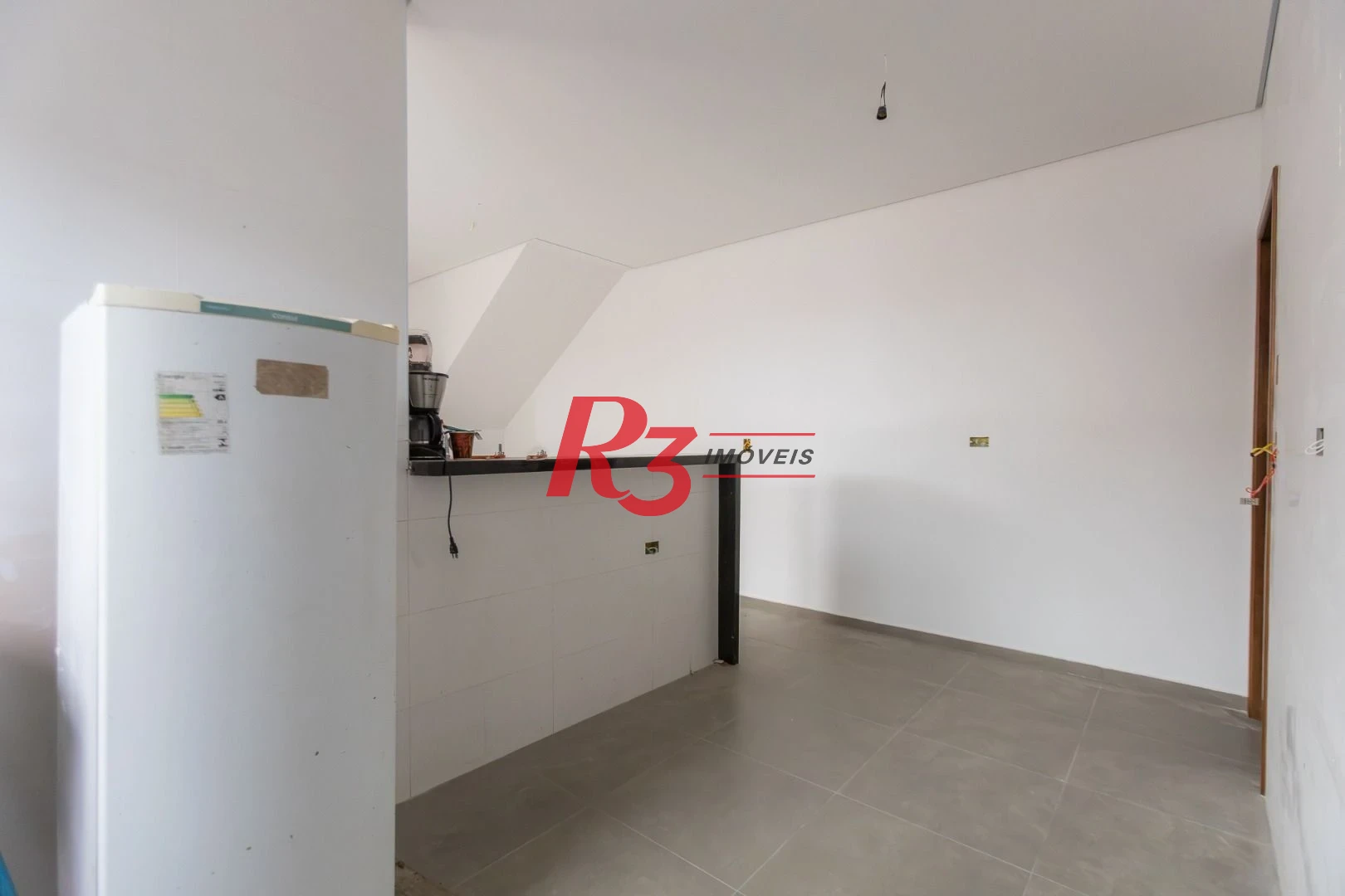 Casa com 3 dormitórios à venda, 104 m² por R$ 950.000,00 - Encruzilhada - Santos/SP