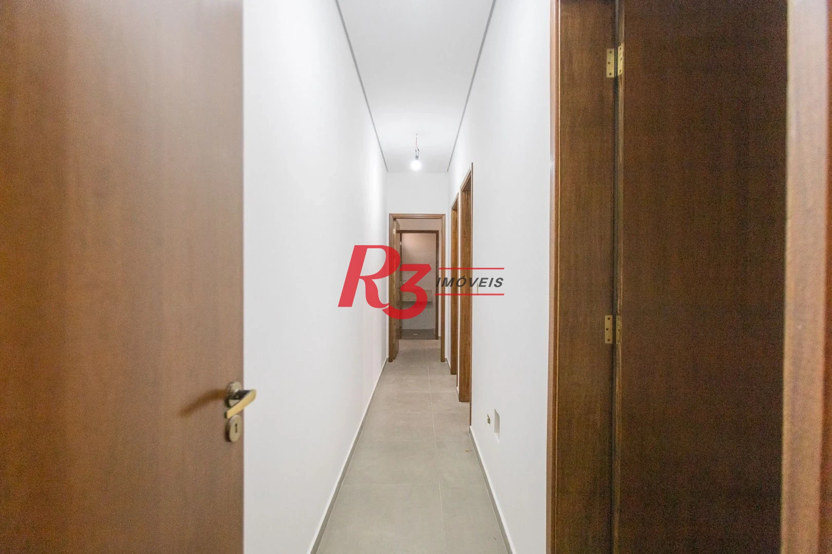 Casa com 3 dormitórios à venda, 104 m² por R$ 950.000,00 - Encruzilhada - Santos/SP