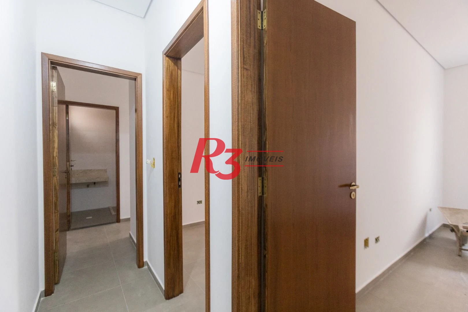 Casa com 3 dormitórios à venda, 104 m² por R$ 950.000,00 - Encruzilhada - Santos/SP