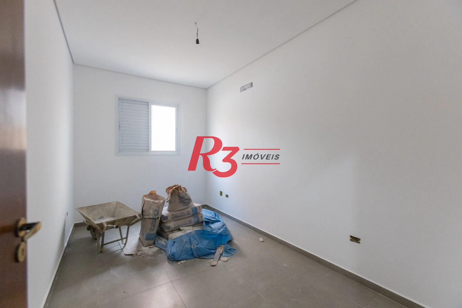 Casa com 3 dormitórios à venda, 104 m² por R$ 950.000,00 - Encruzilhada - Santos/SP