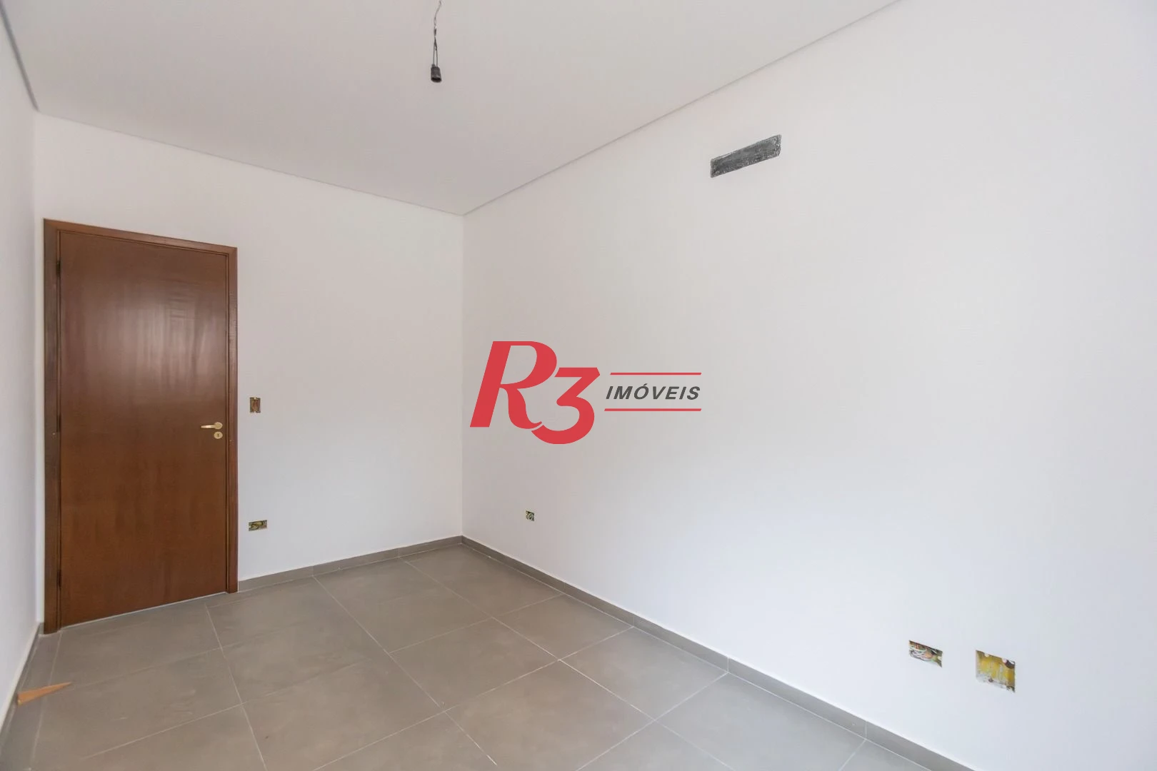 Casa com 3 dormitórios à venda, 104 m² por R$ 950.000,00 - Encruzilhada - Santos/SP