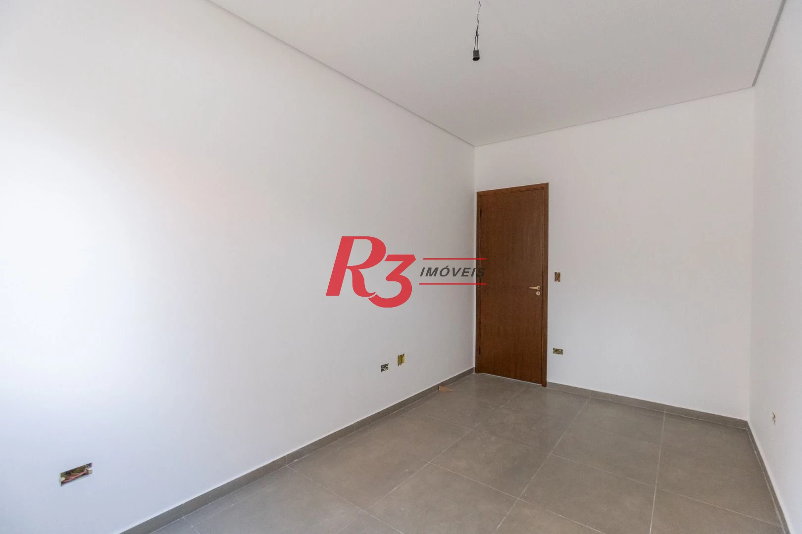 Casa com 3 dormitórios à venda, 104 m² por R$ 950.000,00 - Encruzilhada - Santos/SP
