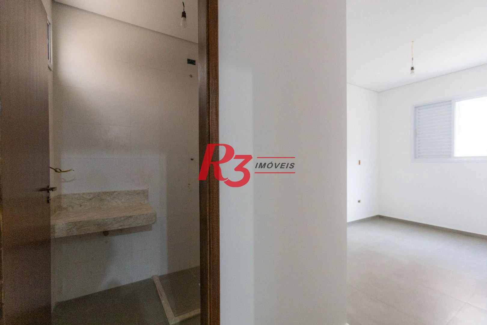 Casa com 3 dormitórios à venda, 104 m² por R$ 950.000,00 - Encruzilhada - Santos/SP