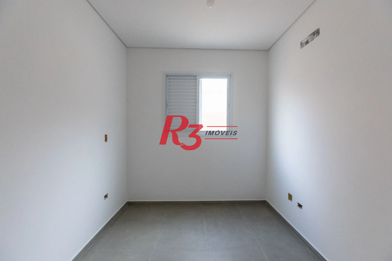 Casa com 3 dormitórios à venda, 104 m² por R$ 950.000,00 - Encruzilhada - Santos/SP
