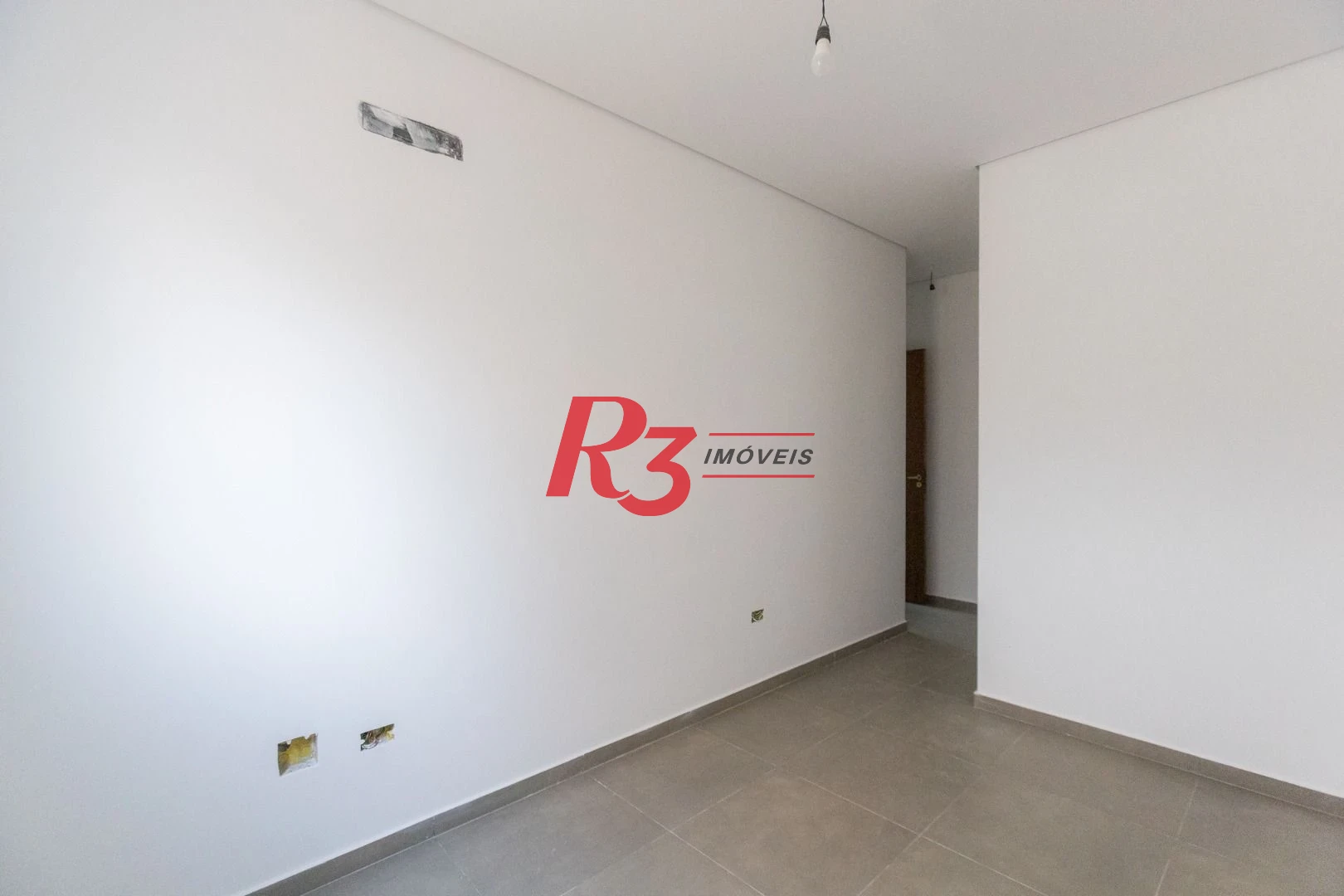 Casa com 3 dormitórios à venda, 104 m² por R$ 950.000,00 - Encruzilhada - Santos/SP