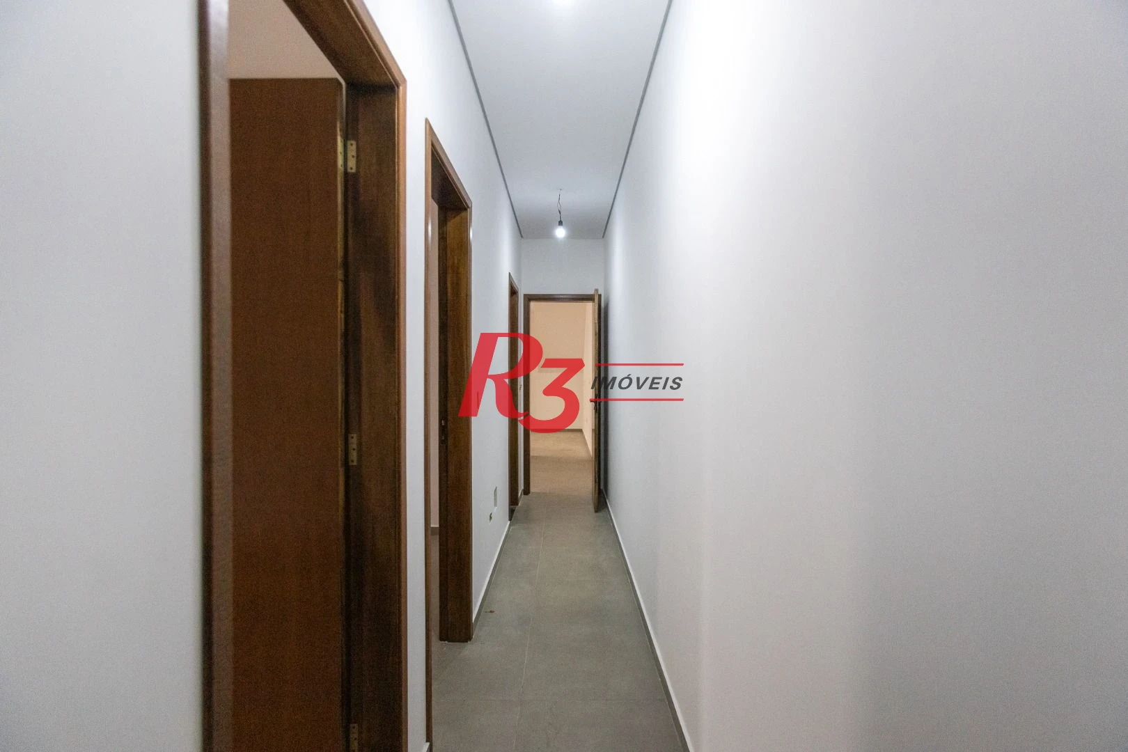 Casa com 3 dormitórios à venda, 104 m² por R$ 950.000,00 - Encruzilhada - Santos/SP