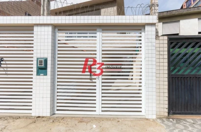 Casa com 3 dormitórios à venda, 104 m² por R$ 950.000,00 - Encruzilhada - Santos/SP