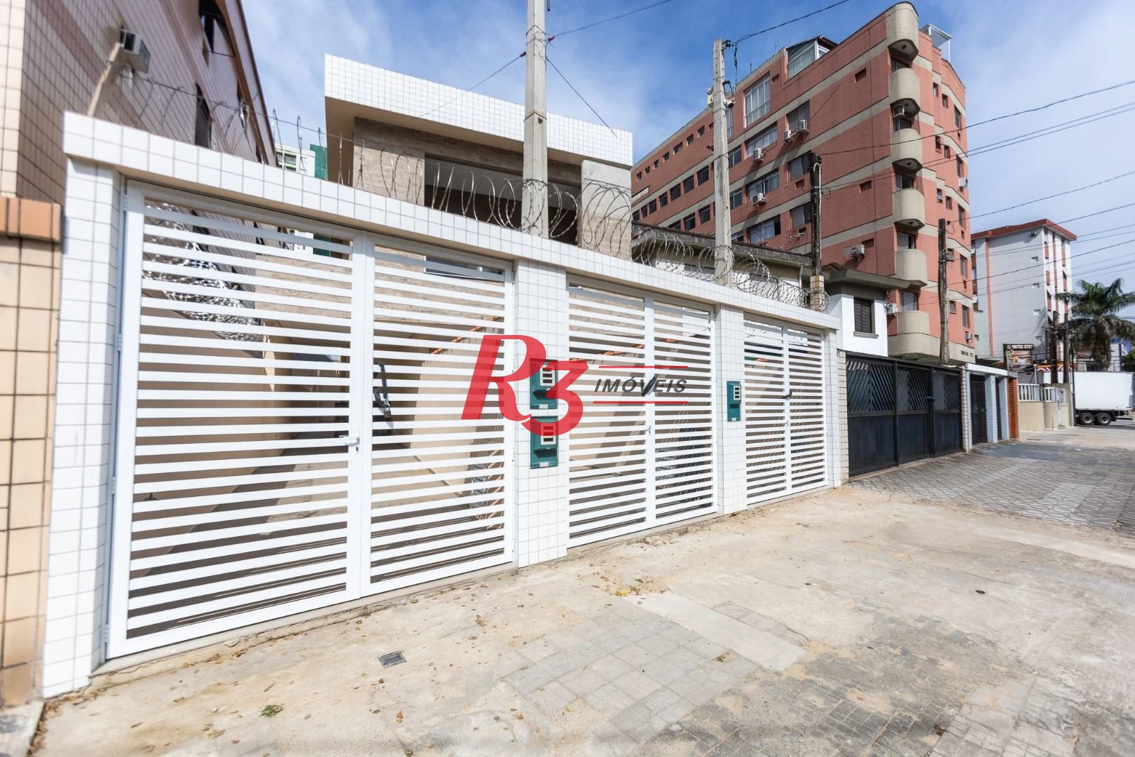 Casa com 3 dormitórios à venda, 104 m² por R$ 950.000,00 - Encruzilhada - Santos/SP