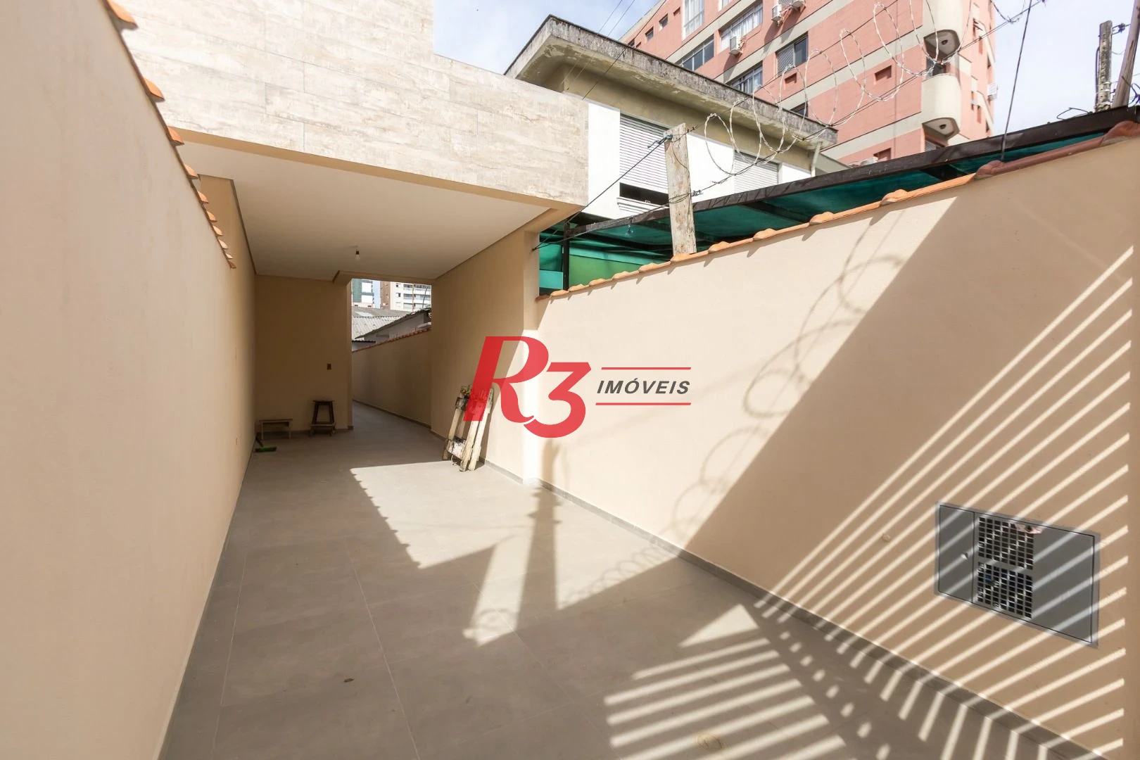 Casa com 3 dormitórios à venda, 104 m² por R$ 950.000,00 - Encruzilhada - Santos/SP