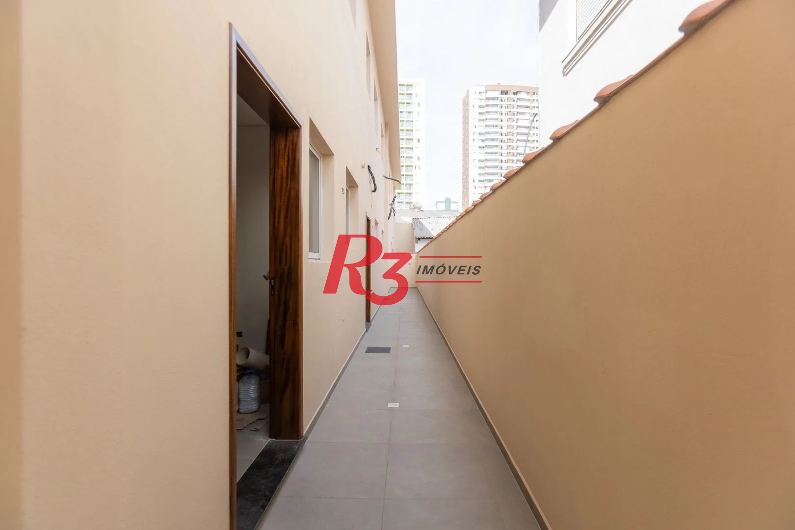 Casa com 3 dormitórios à venda, 104 m² por R$ 950.000,00 - Encruzilhada - Santos/SP
