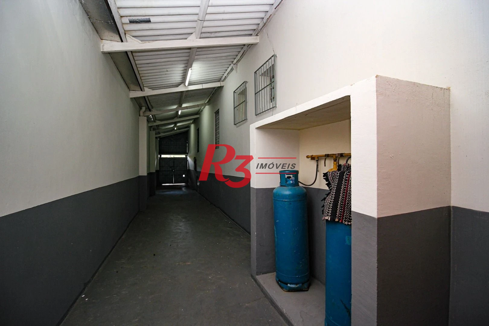 Sobrado com 3 dormitórios à venda, 248 m² por R$ 700.000,00 - Vila Matias - Santos/SP