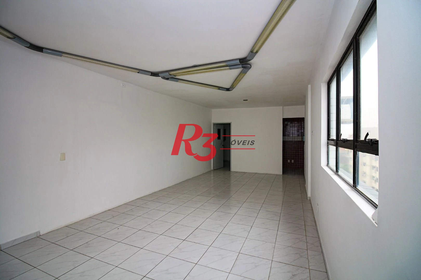 Sala para alugar, 115 m² por R$ 4.400/pacote mensal - Vila Mathias - Santos/SP