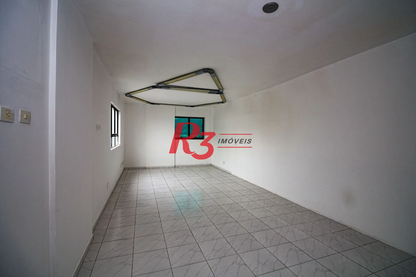 Sala para alugar, 115 m² por R$ 4.400/pacote mensal - Vila Mathias - Santos/SP