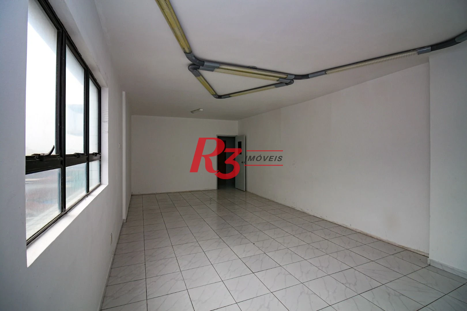 Sala para alugar, 115 m² por R$ 4.400/pacote mensal - Vila Mathias - Santos/SP