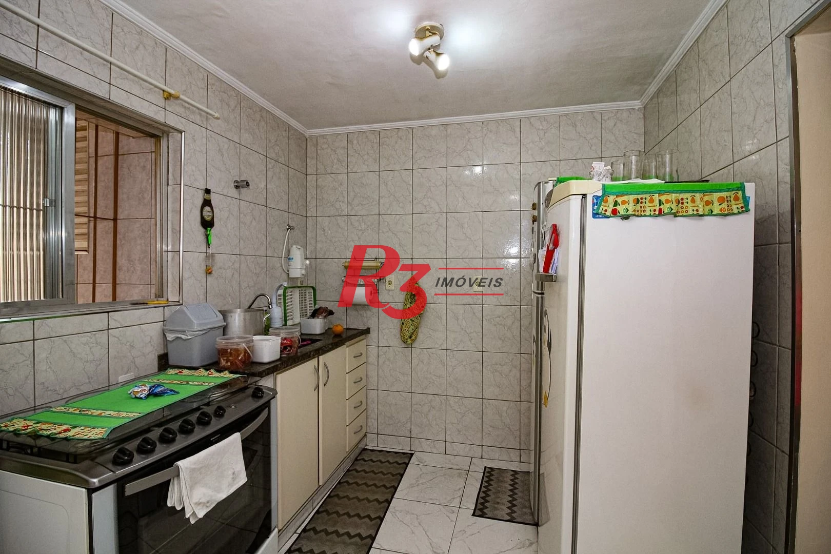 Sobrado com 3 dormitórios à venda, 183 m² por R$ 1.100.000,00 - Vila Belmiro - Santos/SP