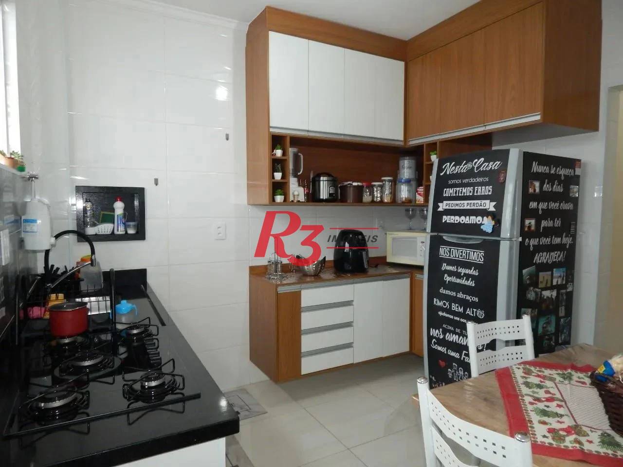 Casa com 2 dormitórios à venda, 73 m² por R$ 320.000,00 - Santa Maria - Santos/SP
