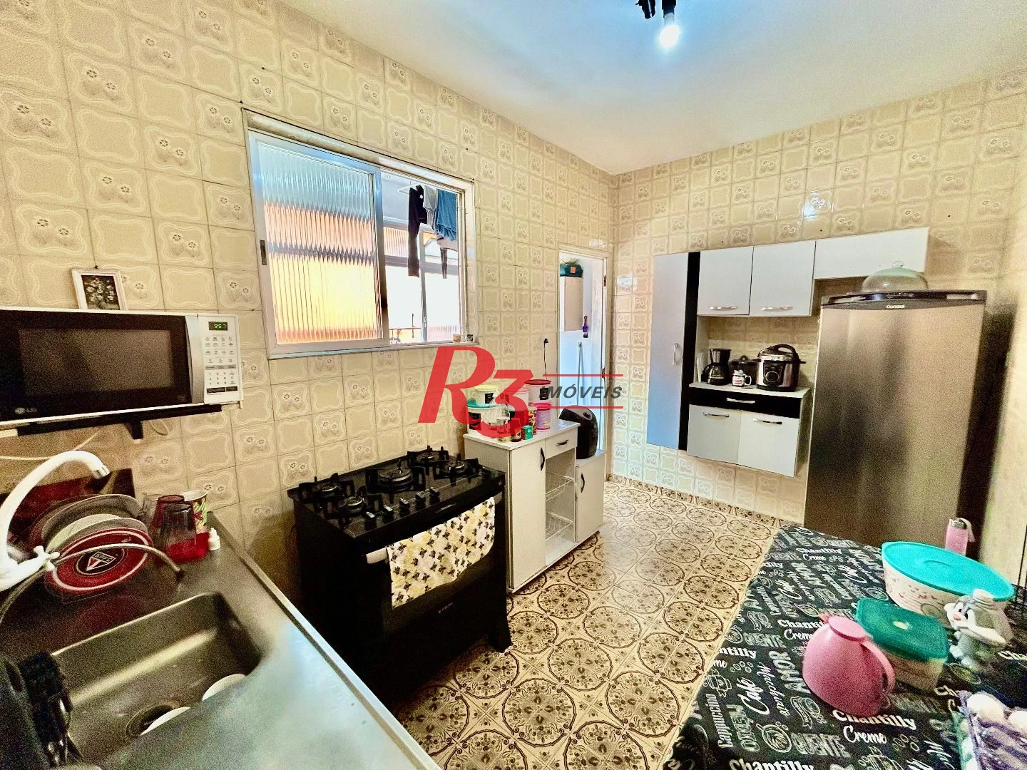 Apartamento com 2 dormitórios à venda, 72 m² por R$ 350.000,00 - Embaré - Santos/SP