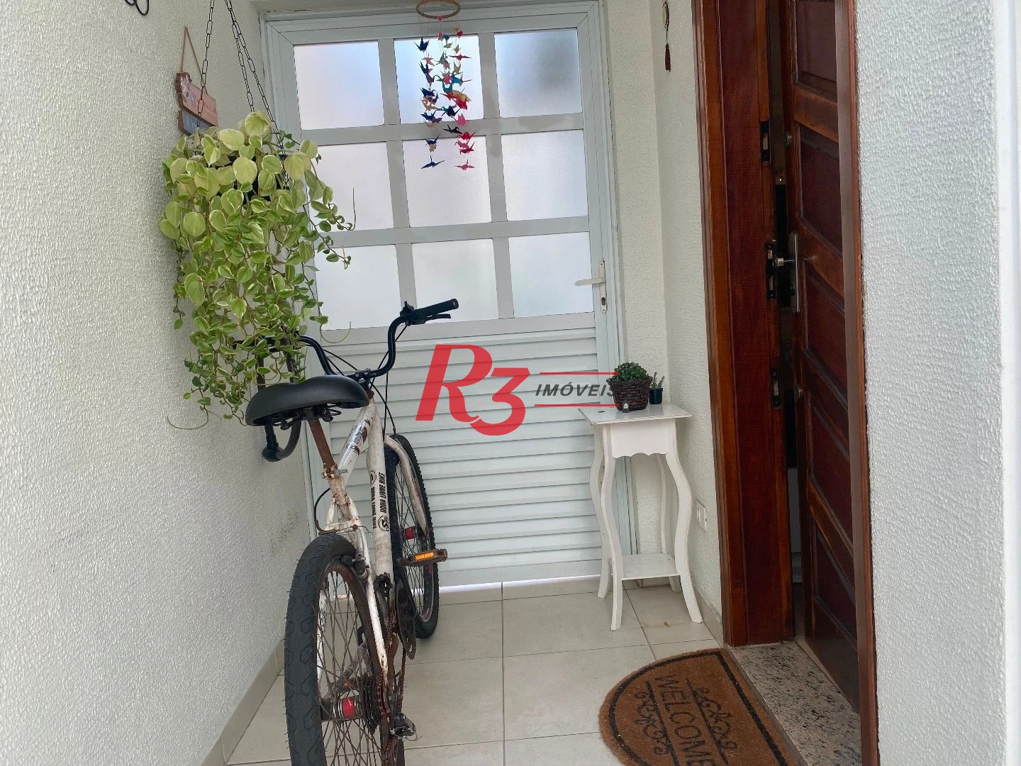 Casa com 3 dormitórios à venda, 106 m² por R$ 990.000,00 - Campo Grande - Santos/SP
