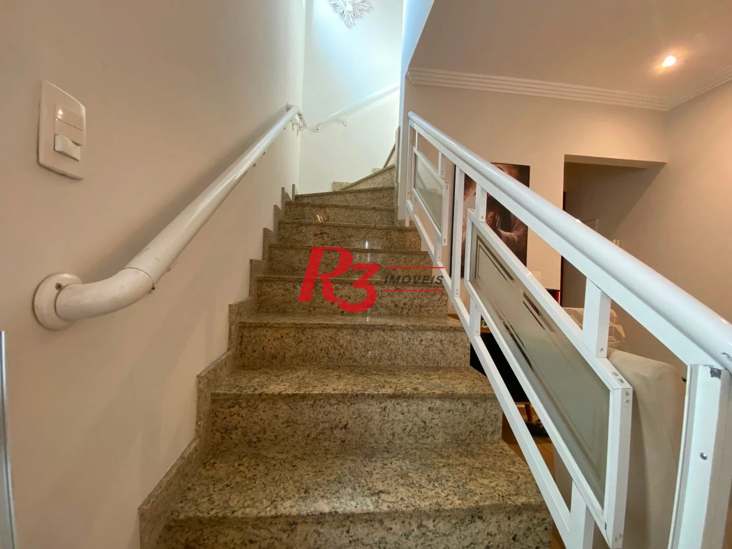 Casa com 3 dormitórios à venda, 106 m² por R$ 990.000,00 - Campo Grande - Santos/SP