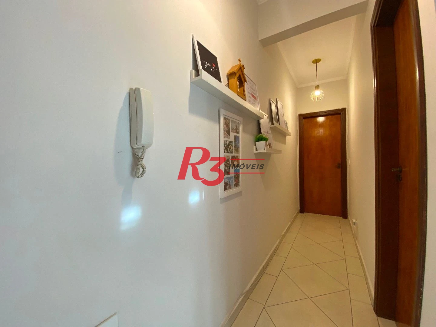 Casa com 3 dormitórios à venda, 106 m² por R$ 990.000,00 - Campo Grande - Santos/SP
