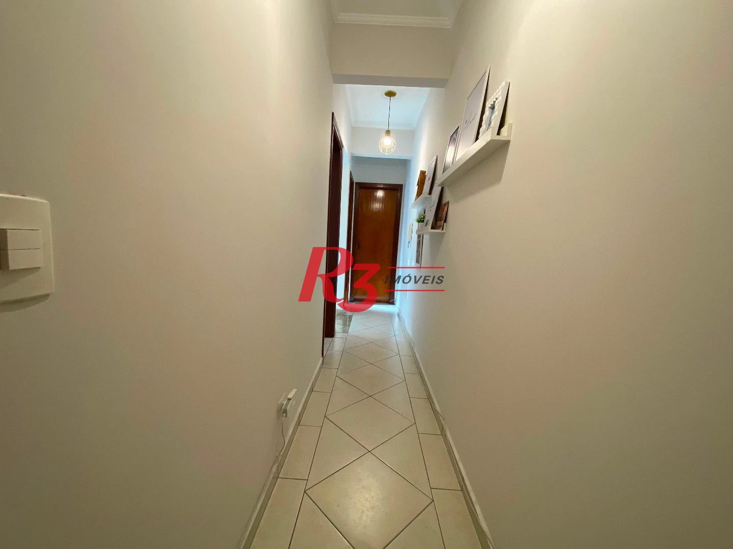 Casa com 3 dormitórios à venda, 106 m² por R$ 990.000,00 - Campo Grande - Santos/SP