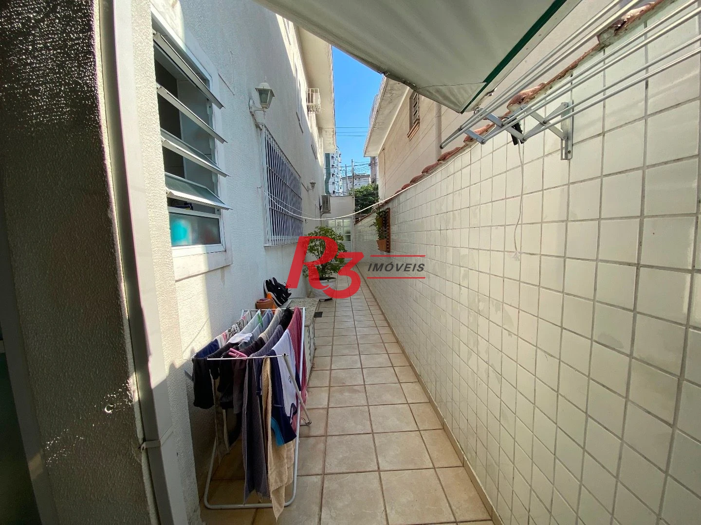 Casa com 3 dormitórios à venda, 106 m² por R$ 990.000,00 - Campo Grande - Santos/SP
