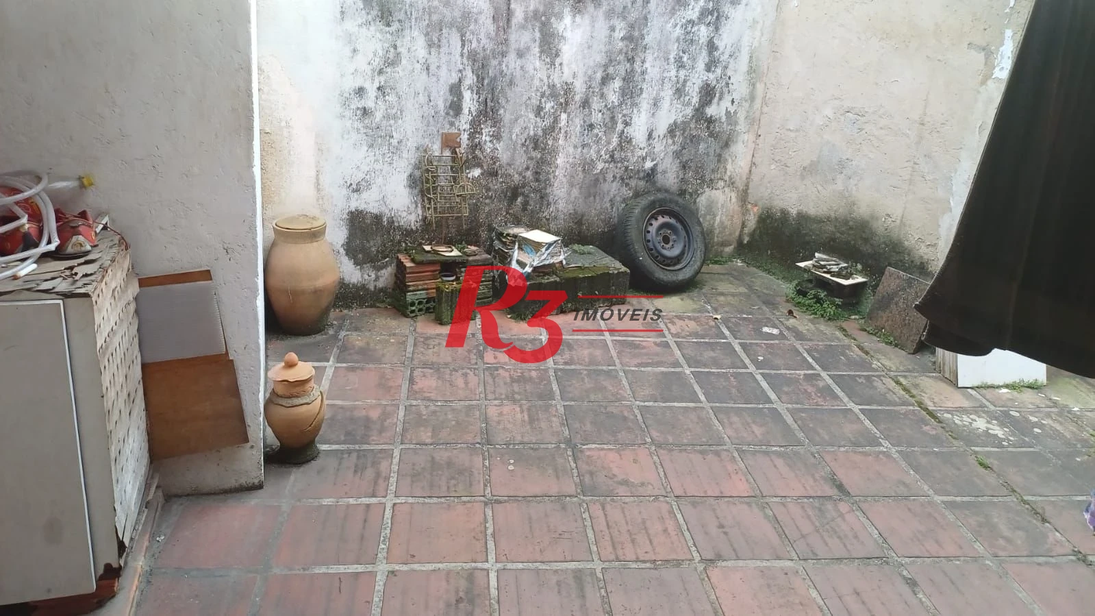 Casa à venda, 103 m² por R$ 1.070.000,00 - Ponta da Praia - Santos/SP