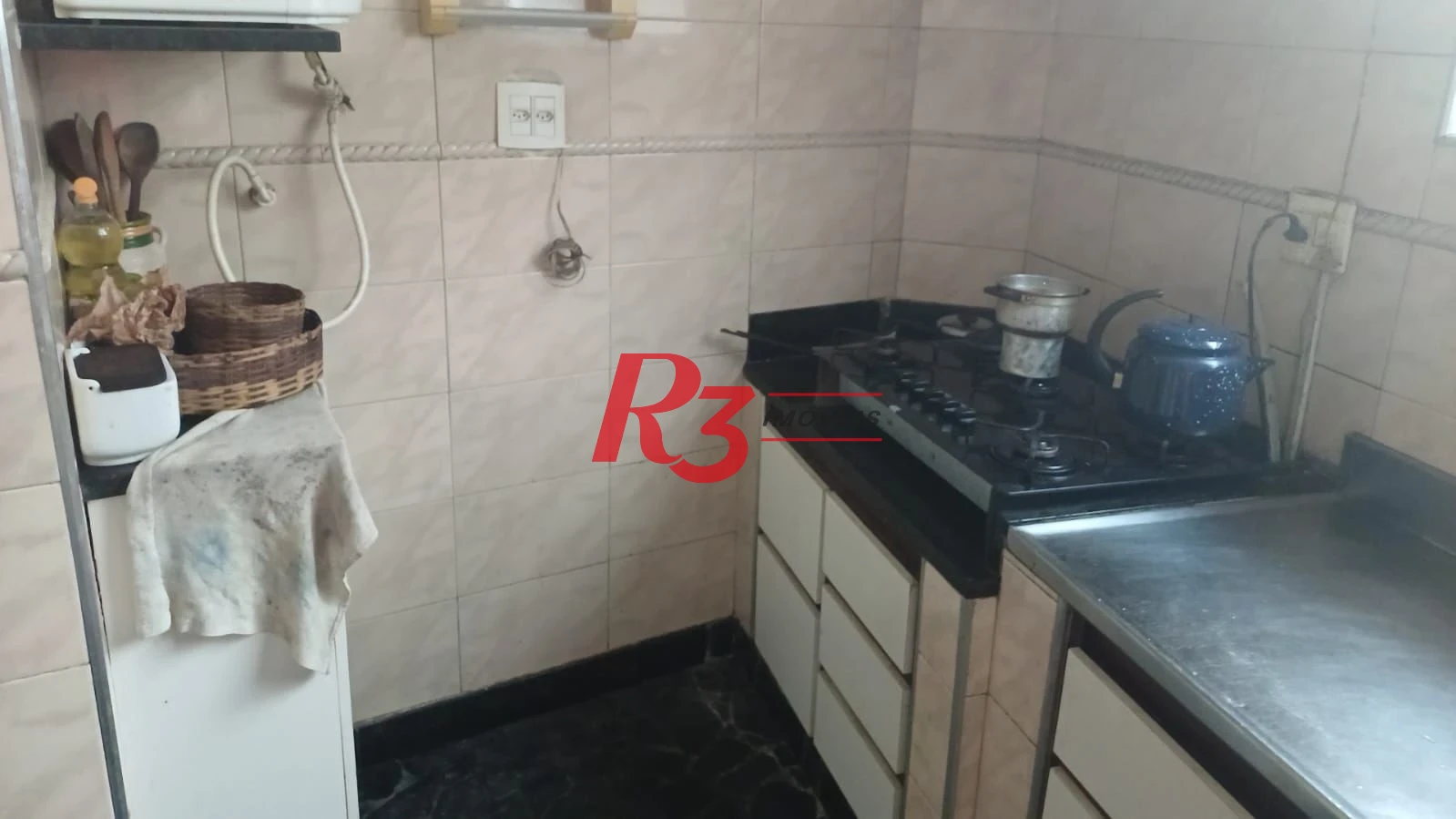 Casa à venda, 103 m² por R$ 1.070.000,00 - Ponta da Praia - Santos/SP