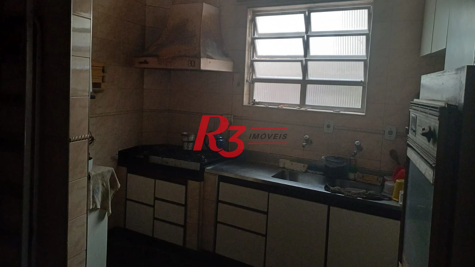 Casa à venda, 103 m² por R$ 1.070.000,00 - Ponta da Praia - Santos/SP