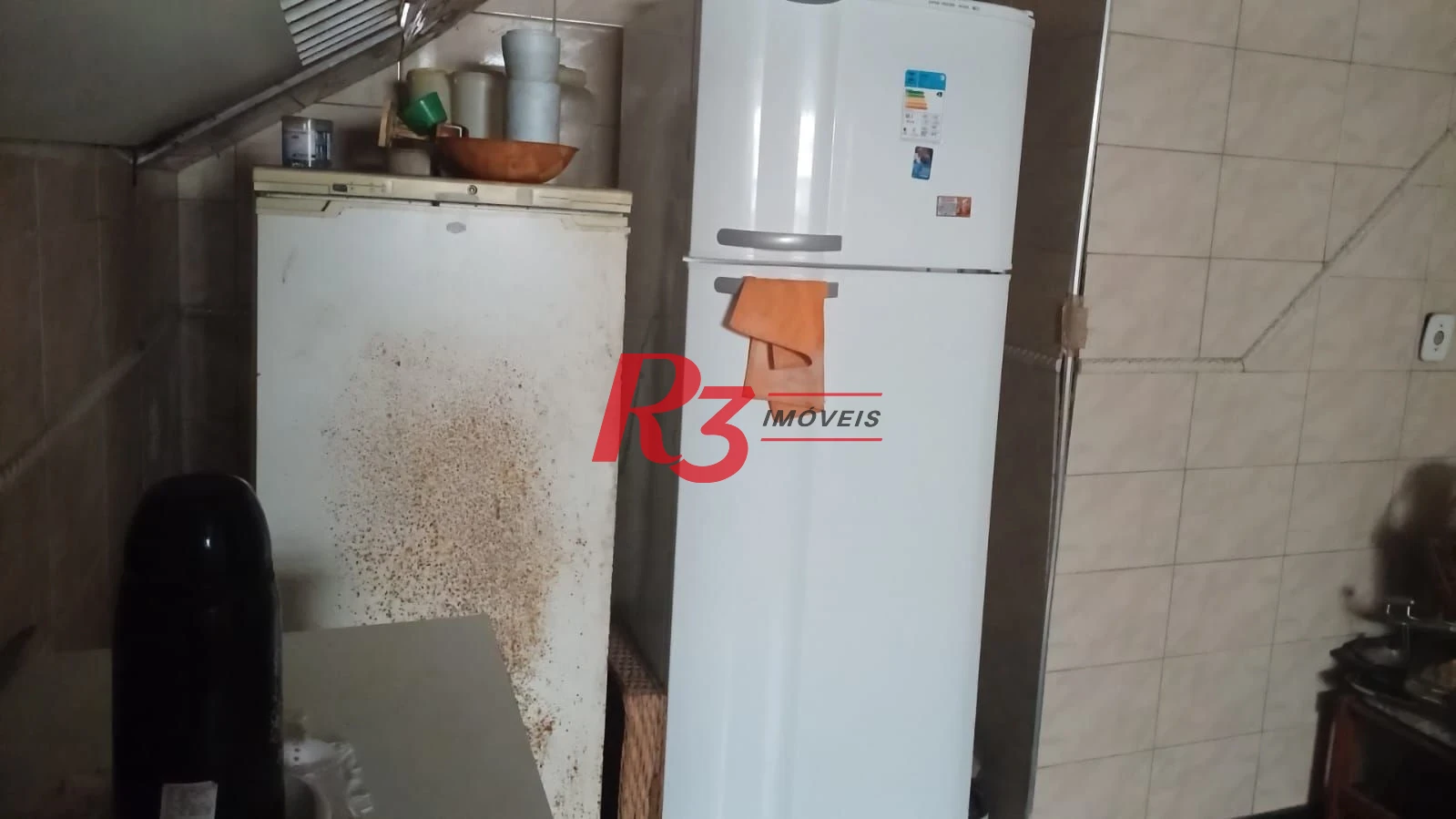 Casa à venda, 103 m² por R$ 1.070.000,00 - Ponta da Praia - Santos/SP