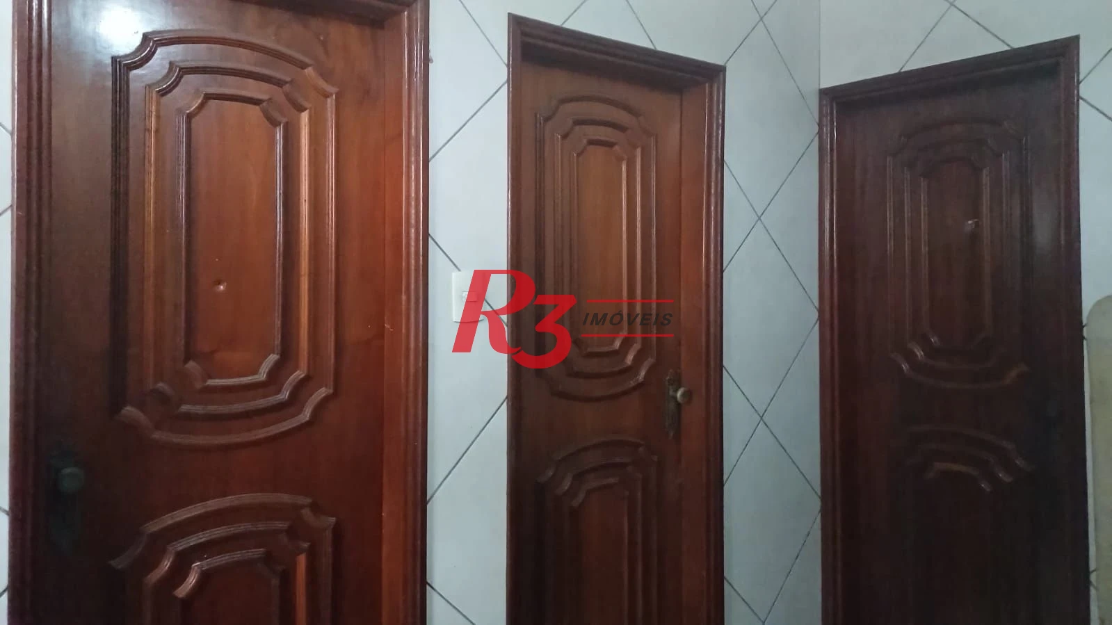 Casa à venda, 103 m² por R$ 1.070.000,00 - Ponta da Praia - Santos/SP