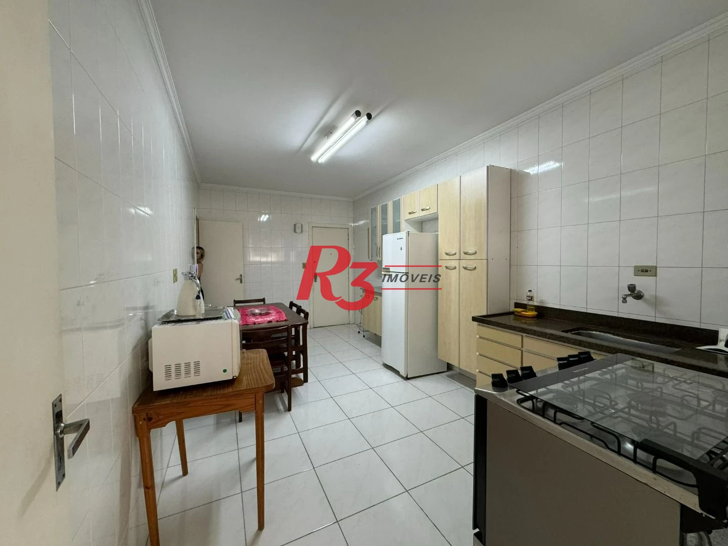 Apartamento com 2 dormitórios na quadra da praia à venda, 127 m² por R$ 700.000 - Aparecida - Santos/SP