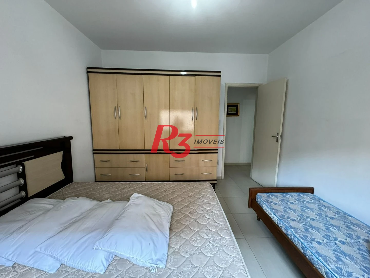 Apartamento com 2 dormitórios na quadra da praia à venda, 127 m² por R$ 700.000 - Aparecida - Santos/SP