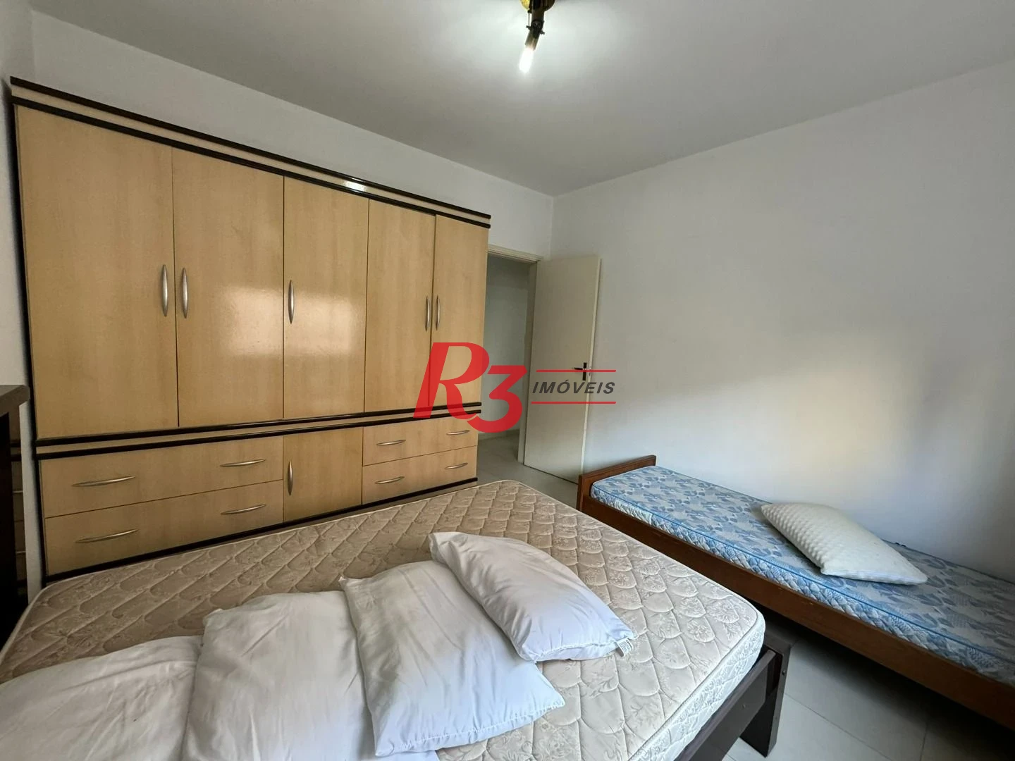 Apartamento com 2 dormitórios na quadra da praia à venda, 127 m² por R$ 700.000 - Aparecida - Santos/SP