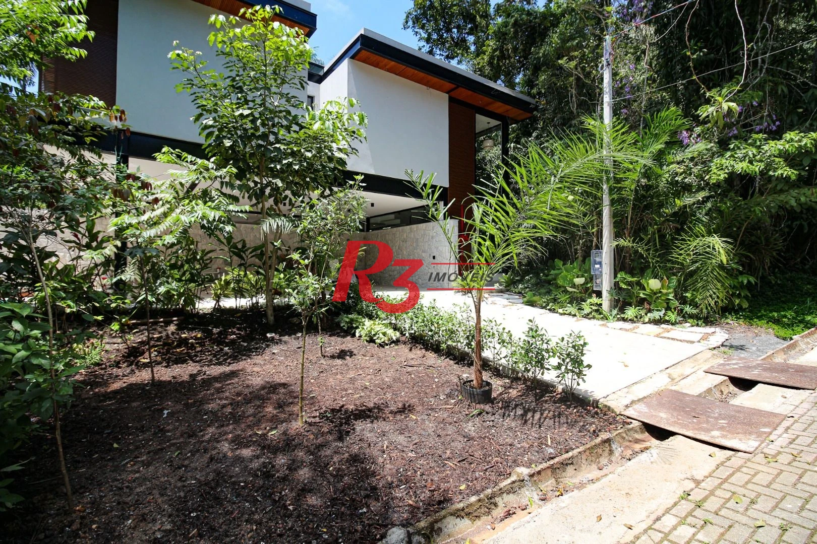 Casa com 5 dormitórios à venda, 500 m² por R$ 12.500.000,00 - Cidade Jardim Tom - Guarujá/SP