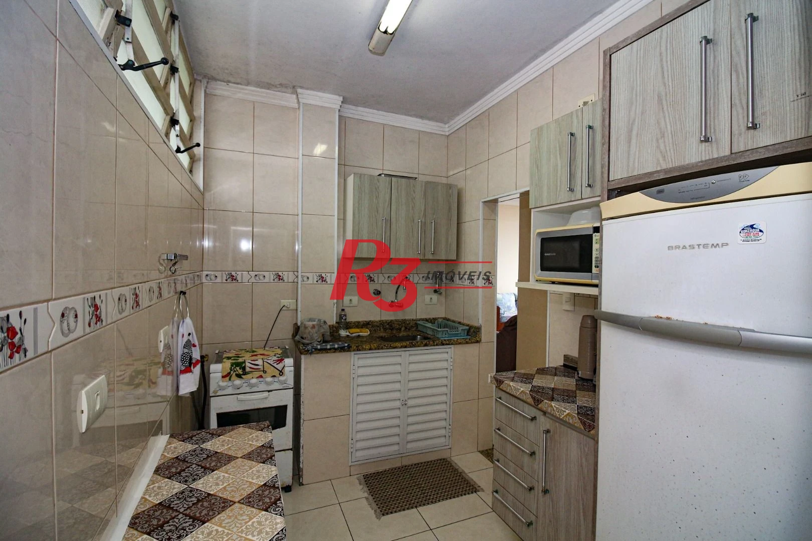 Apartamento com 2 dormitórios à venda, 80 m² por R$ 750.000,00 - Gonzaga - Santos/SP