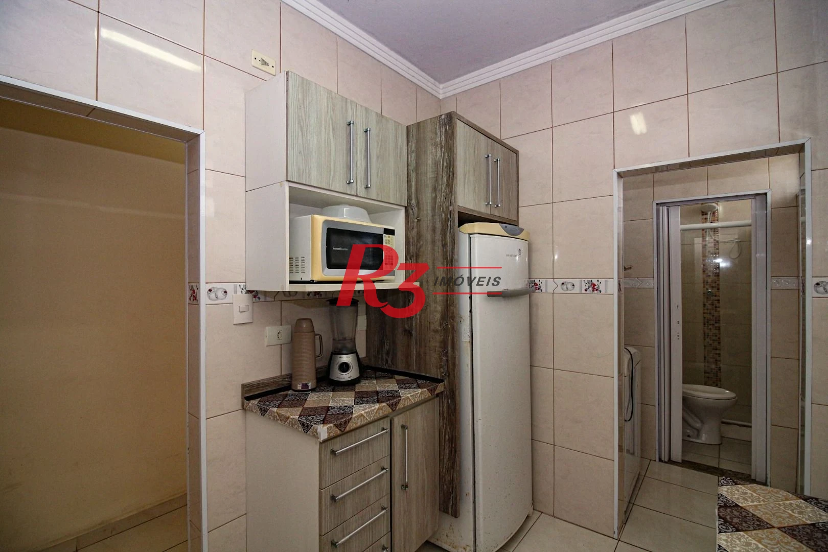 Apartamento com 2 dormitórios à venda, 80 m² por R$ 750.000,00 - Gonzaga - Santos/SP
