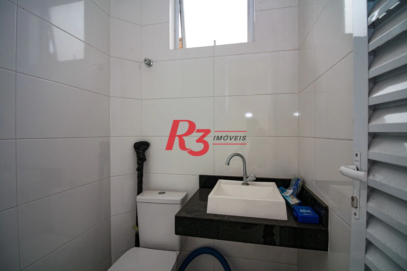 Casa com 3 dormitórios à venda, 240 m² por R$ 1.700.000,00 - Boqueirão - Santos/SP