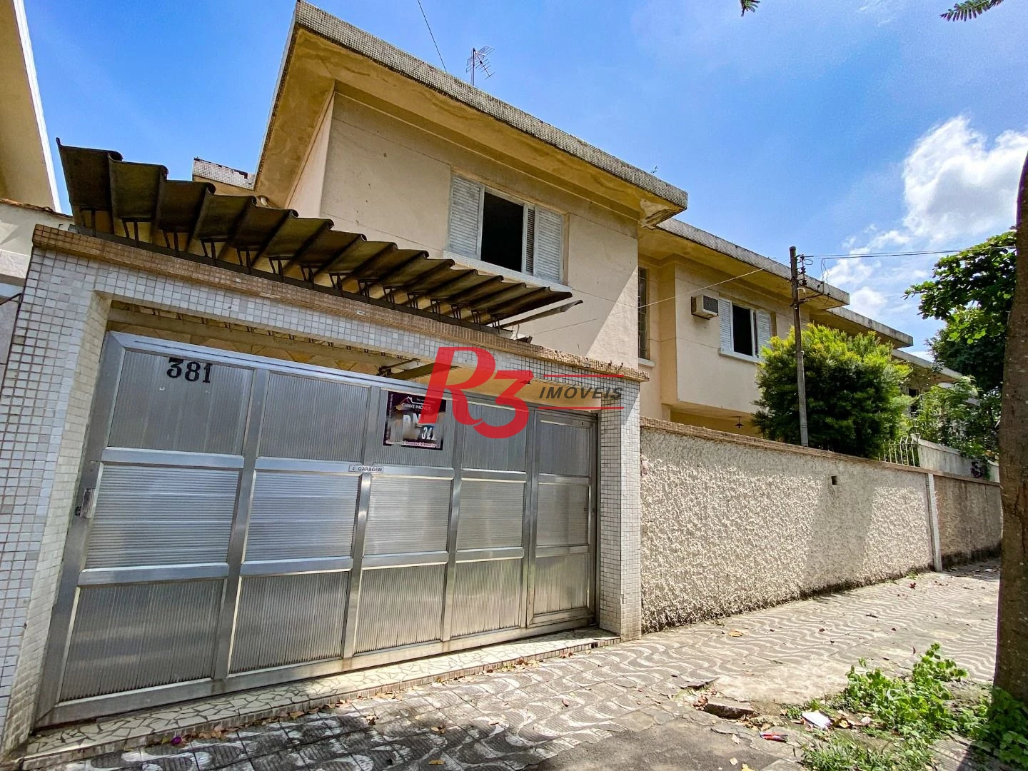 Casa com 4 dormitórios à venda, 175 m² por R$ 1.000.000,00 - Encruzilhada - Santos/SP