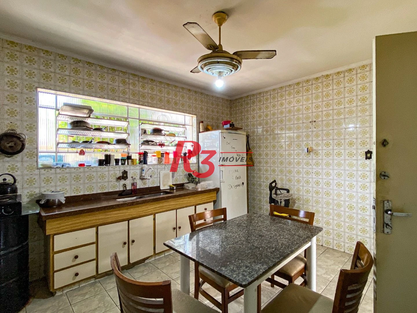 Casa com 4 dormitórios à venda, 175 m² por R$ 1.000.000,00 - Encruzilhada - Santos/SP