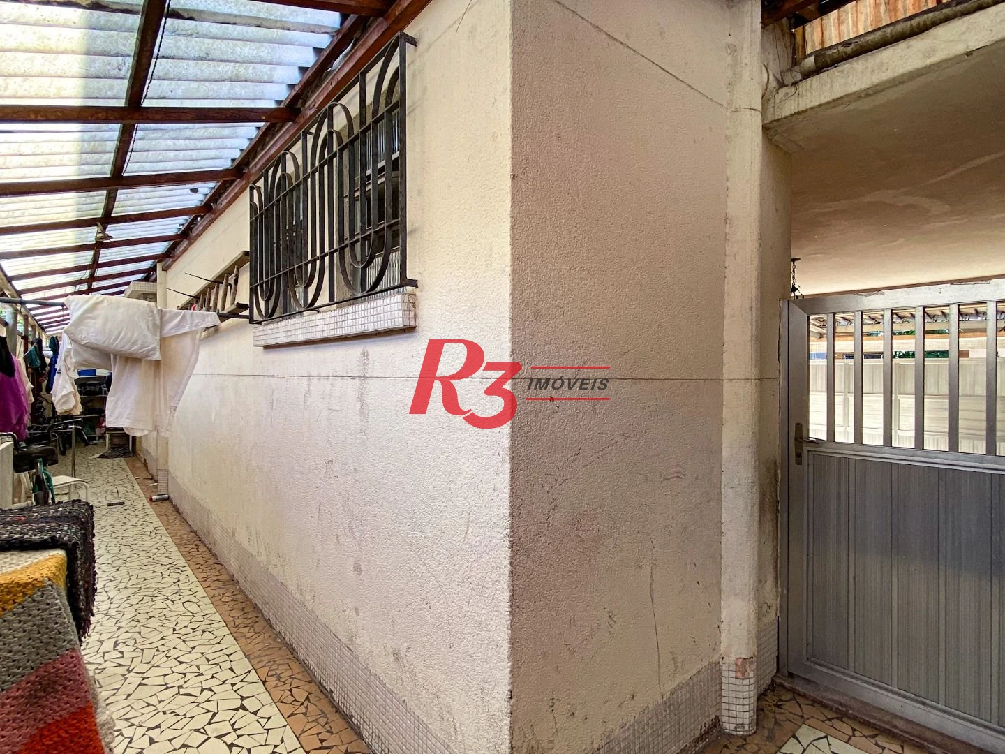 Casa com 4 dormitórios à venda, 175 m² por R$ 1.000.000,00 - Encruzilhada - Santos/SP