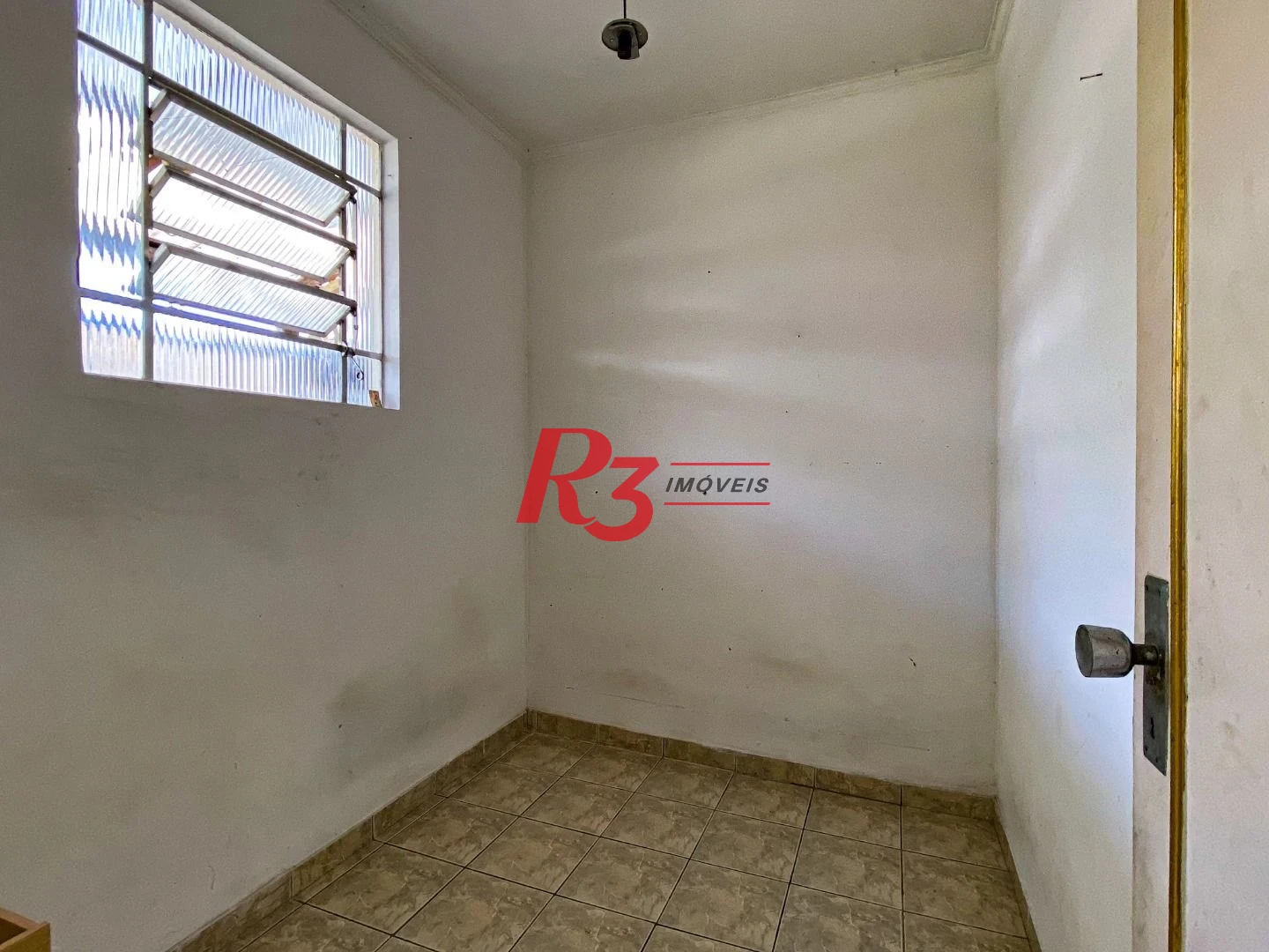 Casa com 4 dormitórios à venda, 175 m² por R$ 1.000.000,00 - Encruzilhada - Santos/SP
