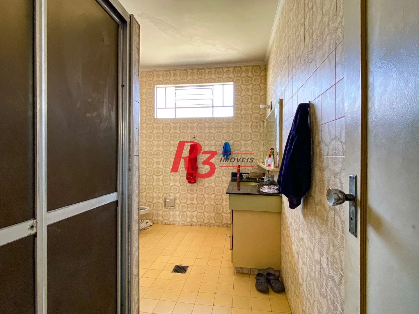 Casa com 4 dormitórios à venda, 175 m² por R$ 1.000.000,00 - Encruzilhada - Santos/SP