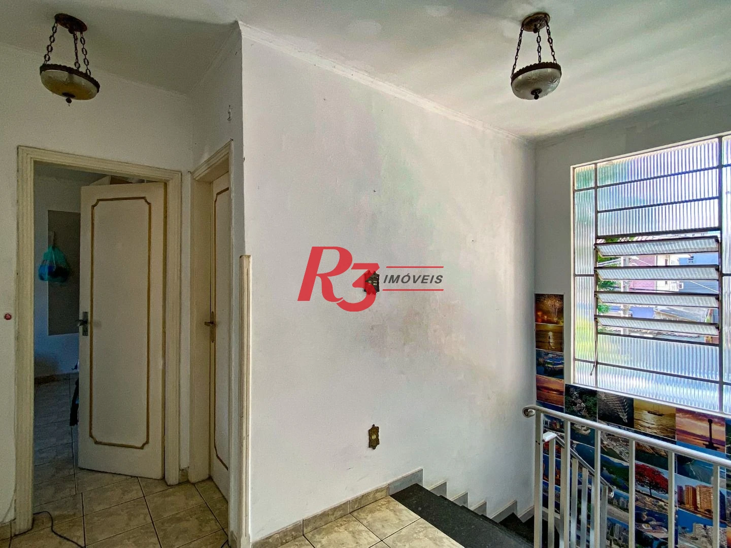 Casa com 4 dormitórios à venda, 175 m² por R$ 1.000.000,00 - Encruzilhada - Santos/SP
