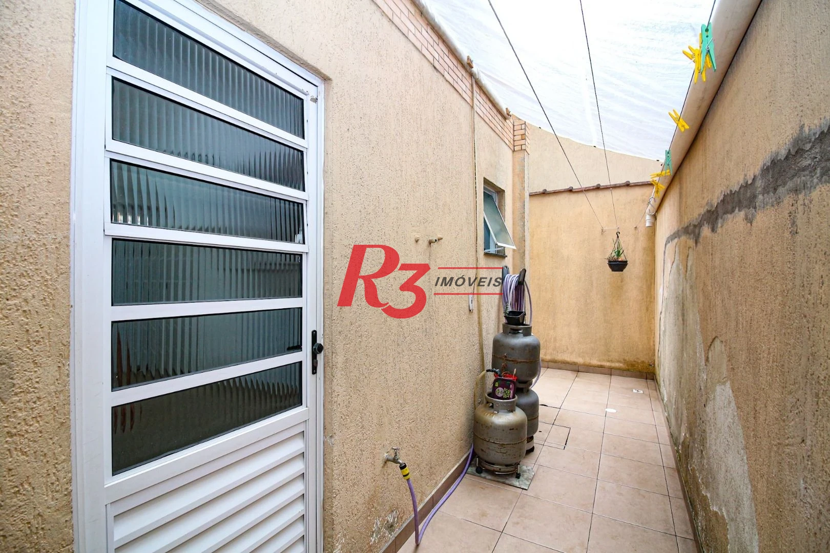 Casa à venda, 87 m² por R$ 458.000,00 - Vila São Jorge - Santos/SP