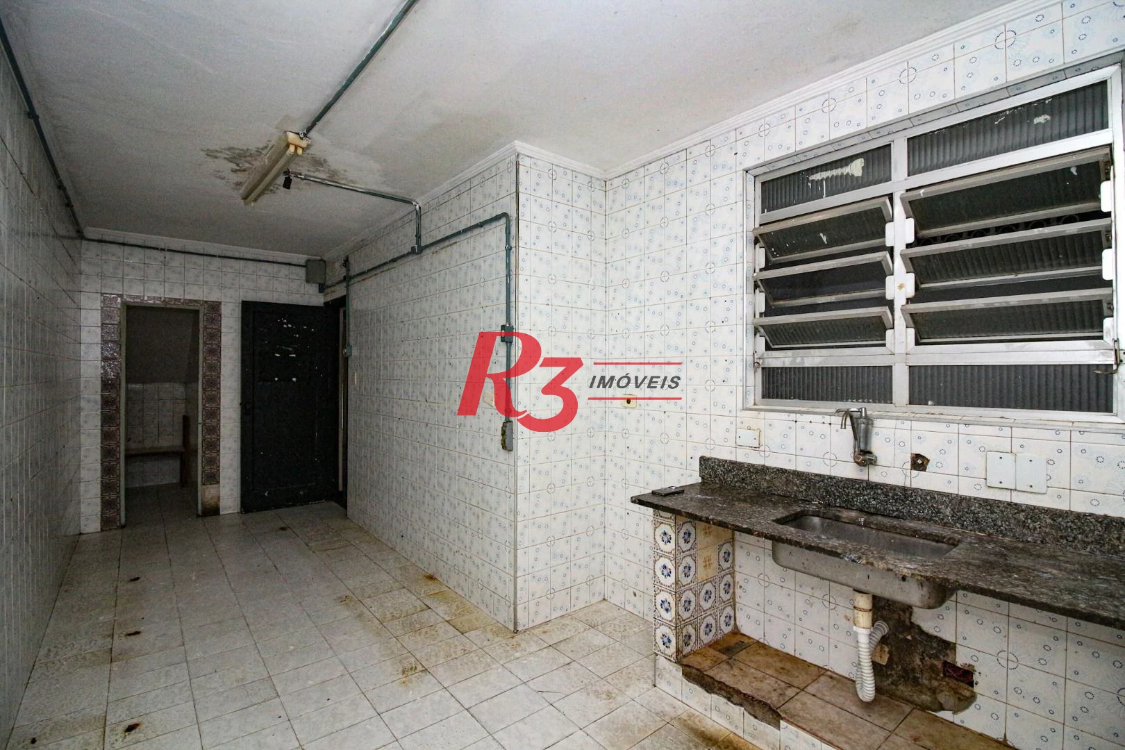 Casa à venda, 110 m² por R$ 672.000,00 - Macuco - Santos/SP
